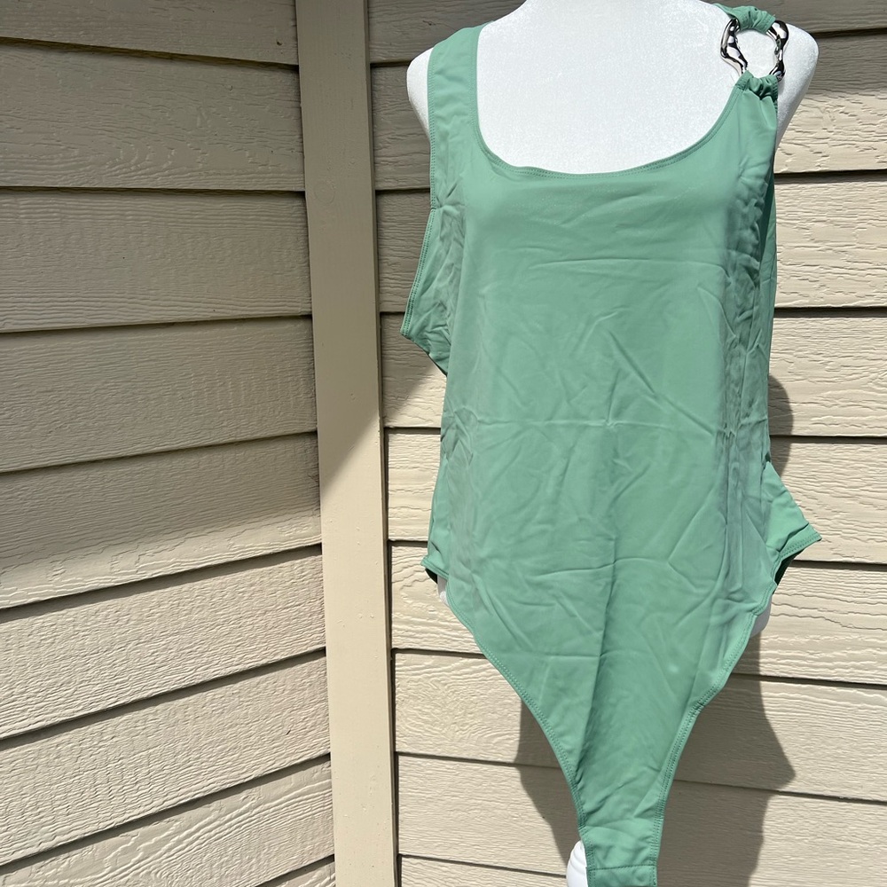 E745 NWT Cider Solid O-Ring Body Suit
